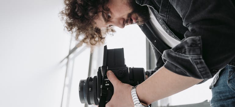 a photographer taking a picture of a staged home