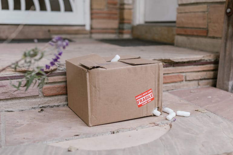 A cardboard box with holes