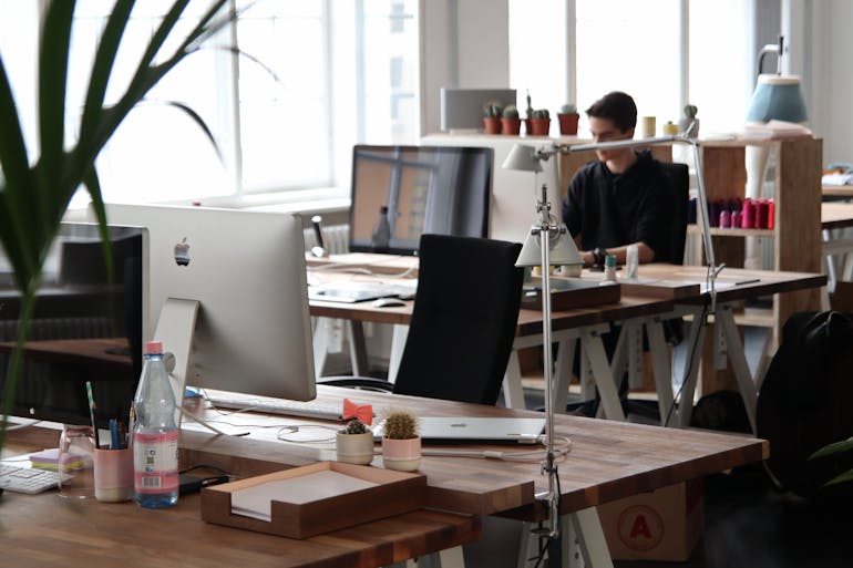 Man sitting at the office desk 