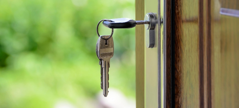 Black Handled Key on Key Hole
