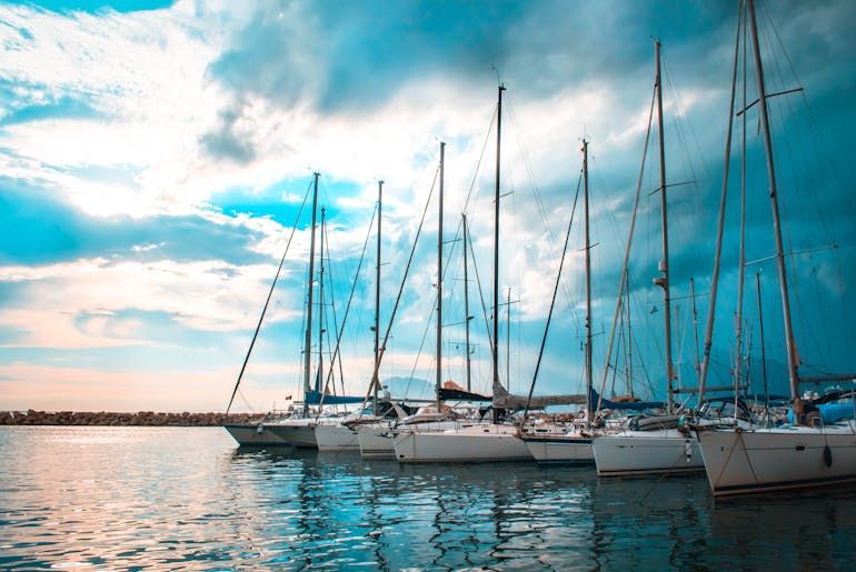 Six white boats on the photo 