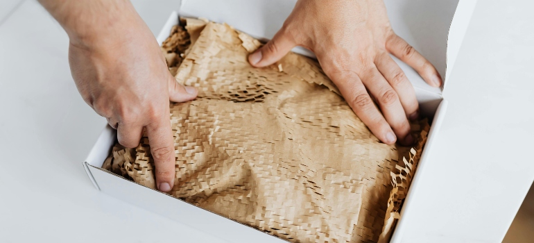 Man preparing package for shipment