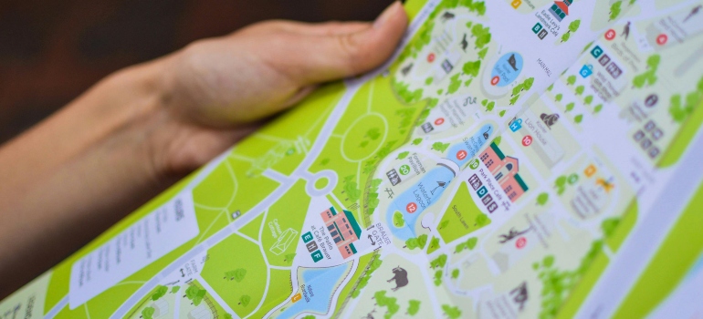 Person Holding City Map