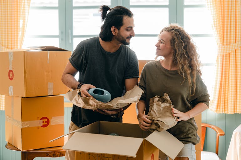 Couple looking at each other and thinking about moving overseas from the DC Area