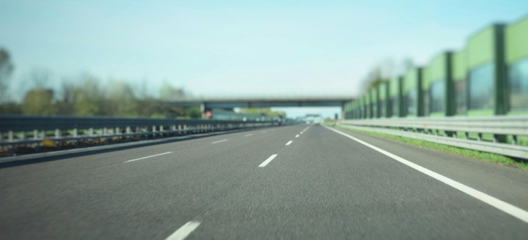 Gray Asphalt Road Under Blue Sky