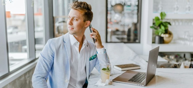 Person looking through the window and thinking about selling your home in Virginia