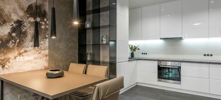 Modern kitchen with creative lighting and dining area