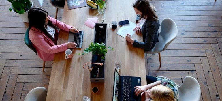 office workers working to schedule an office relocation in Virginia