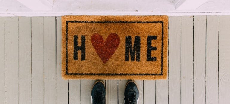 a person standing on their front porch