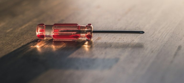 Screwdriver on a wooden surface