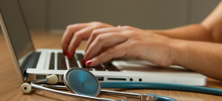 Doctor working on a laptop