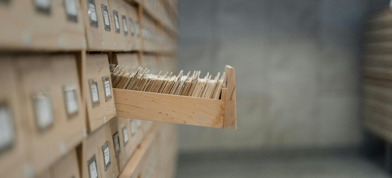 A drawer filled with organized folders symbolizing the importance of documentation after moving.