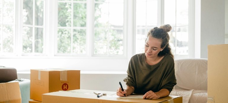 a girl writing about moving from Washington DC to Frederick