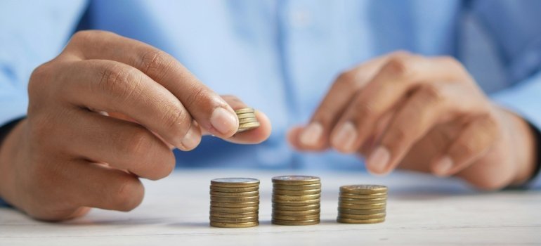 Person counting coins