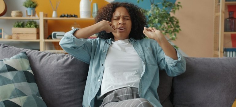 Tired person on a couch