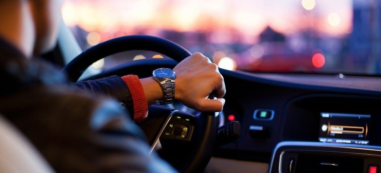 Person driving a car