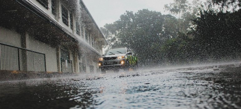 Car driving in rain