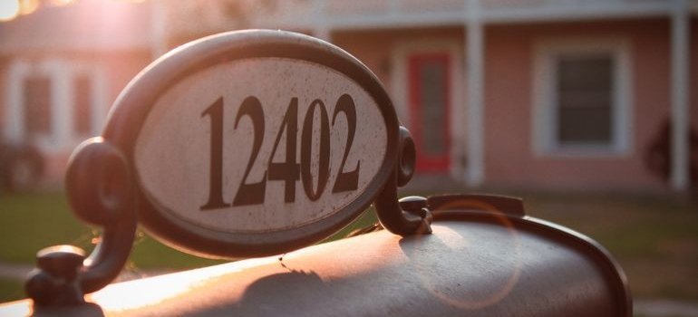 Mailbox in front of a house.